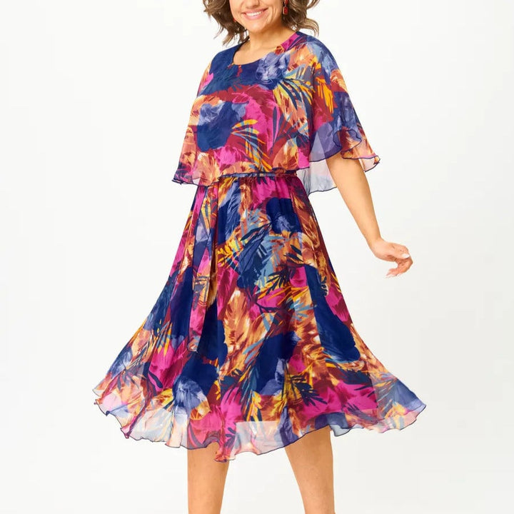 Side view of the Savannah dress highlighting graceful movement and feminine silhouette