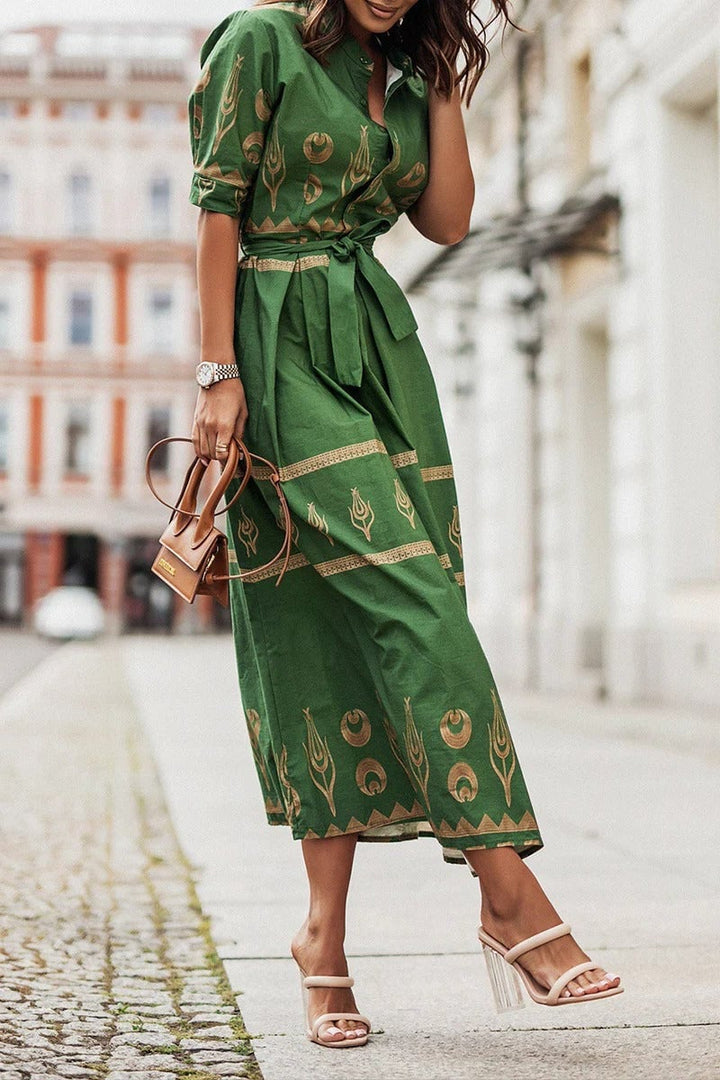 Front view of the Savannah midi dress in green showing the A-line silhouette and 3/4 sleeves