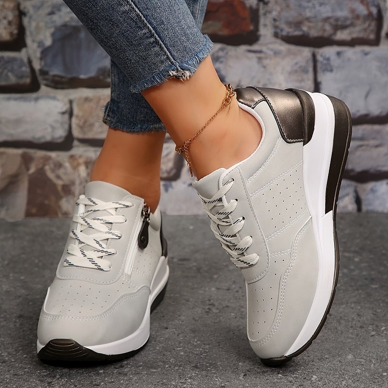 Scarlett orthopedic sneaker in Suede Gray worn on foot, showcasing comfortable fit and style