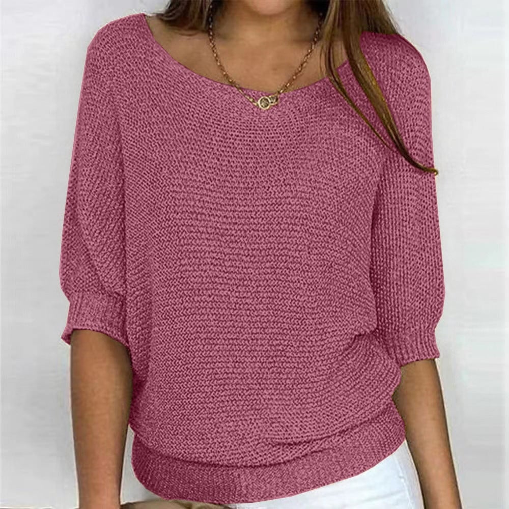 Close-up of the Scarlett all-season sweater showing soft fabric texture and flattering drape on a female model