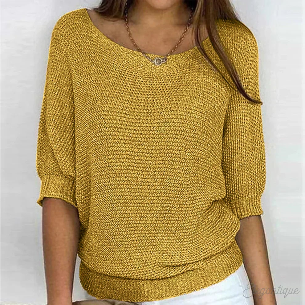 Scarlett all-season sweater displayed in multiple color options including beige, black, white, and purple