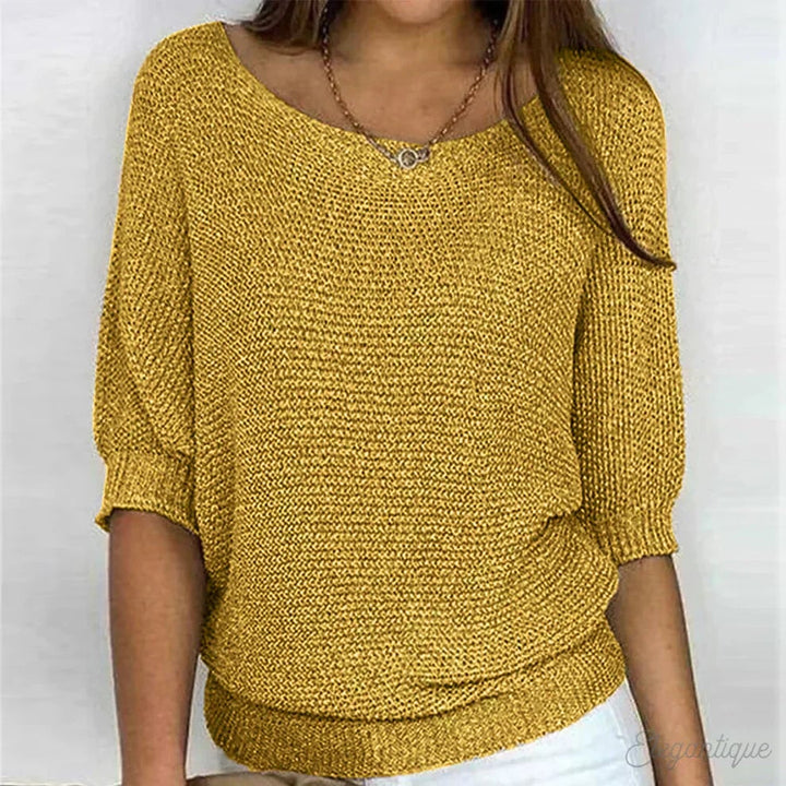 Scarlett all-season sweater displayed in multiple color options including beige, black, white, and purple