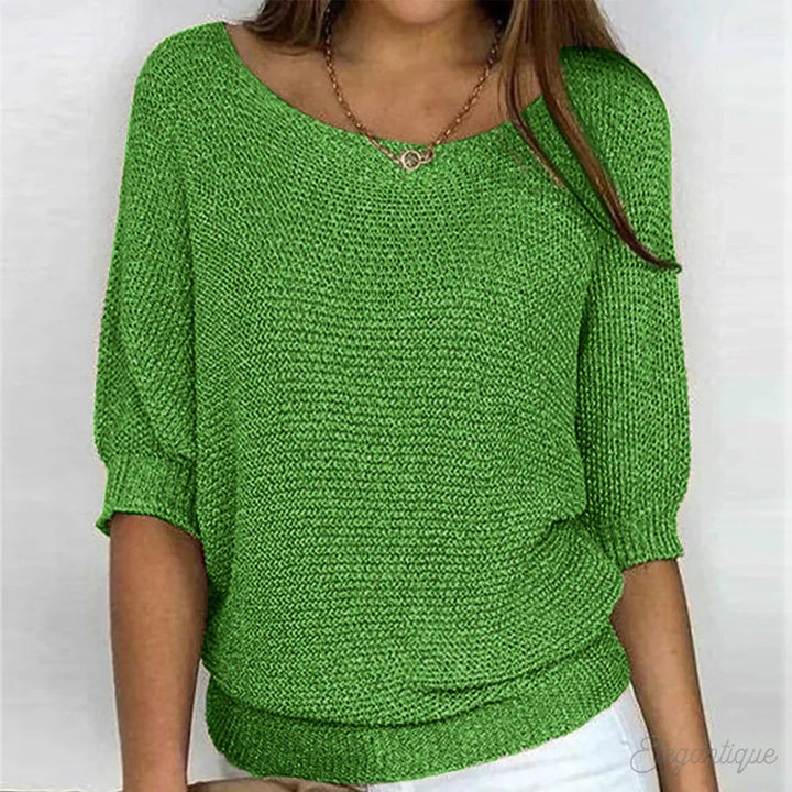 Detail shot of the Scarlett sweater neckline and soft fabric, emphasizing its premium quality and comfortable feel