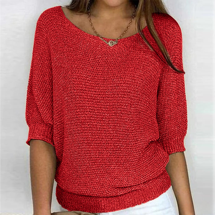 Woman in the Scarlett all-season sweater in yellow, smiling in a bright natural-light setting for a fresh seasonal look