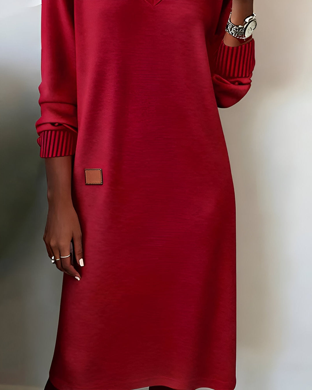Flat-lay of all three Scarlett midi dress color options: white, brown, and red