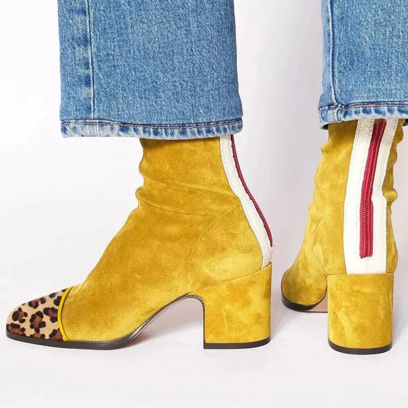 Scarlett square toe heeled boots in yellow, front three-quarter view on neutral background