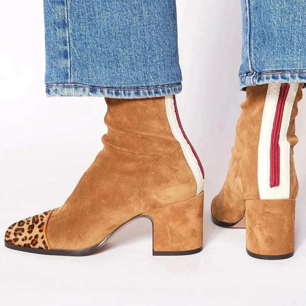 Scarlett heeled boots in brown styled with straight-leg jeans, lifestyle shot