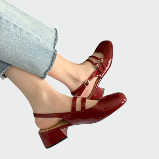 Scarlett red patent mary jane pumps side profile highlighting block heel height and high-shine upper