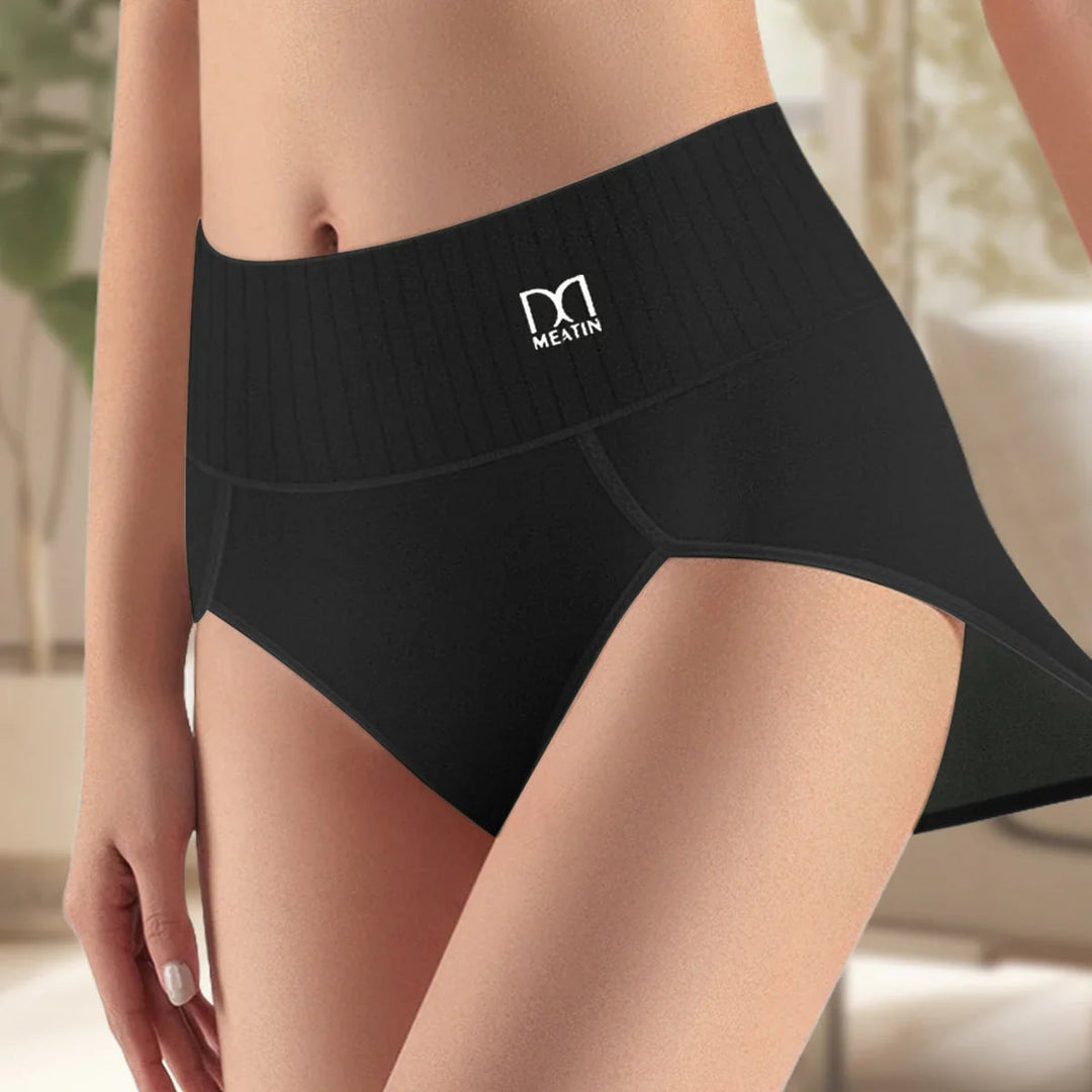 Close-up of seamless waistband on high-waist shaping briefs in black for a no-show finish
