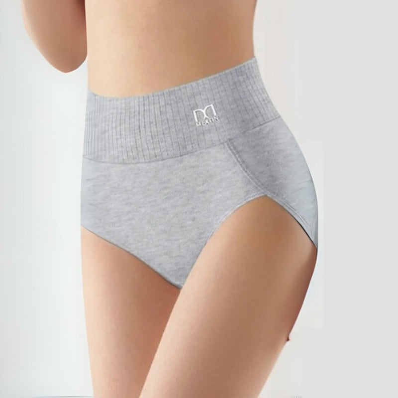 High-waist shaping briefs in pink laid flat showing breathable fabric and seamless construction