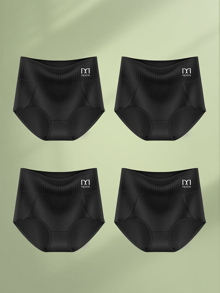 Woman wearing green high-waist shaping briefs showing flexible, body-adaptive fit