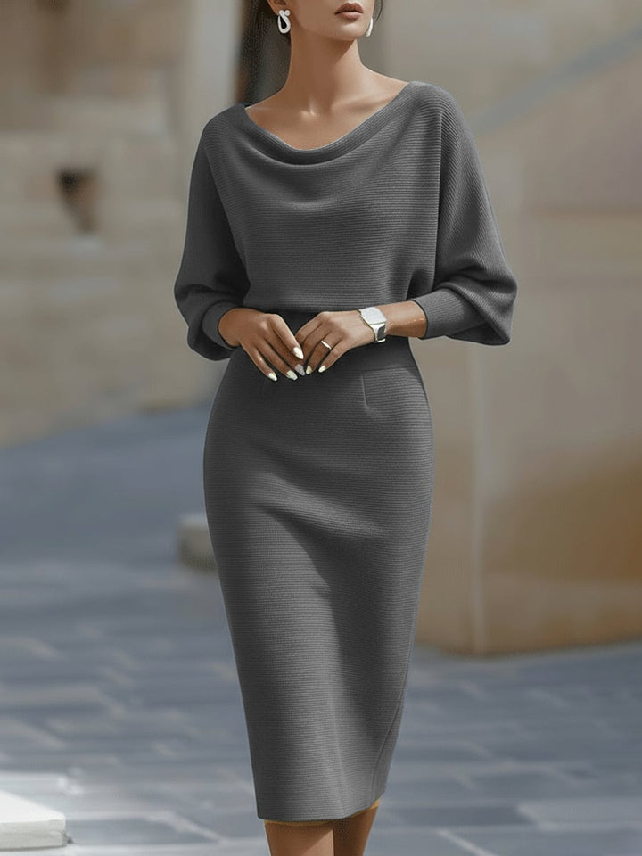 Side profile of the Selah midi dress highlighting the elongating midi length and graceful movement