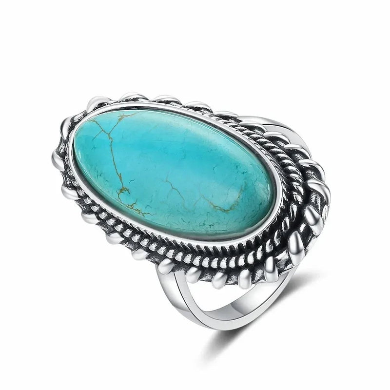 Turquoise ring shown from a slight angle highlighting the stone and band detail
