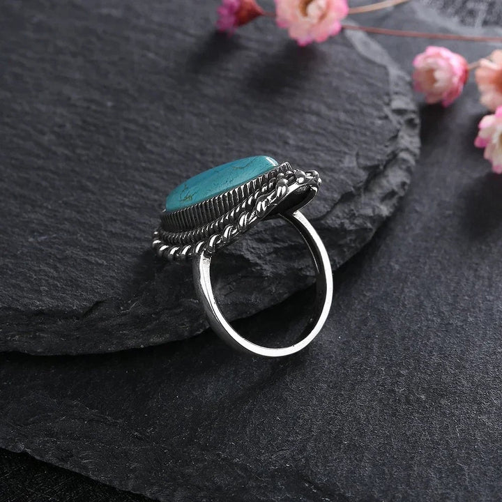Side profile of the turquoise ring showing the setting height and stone depth