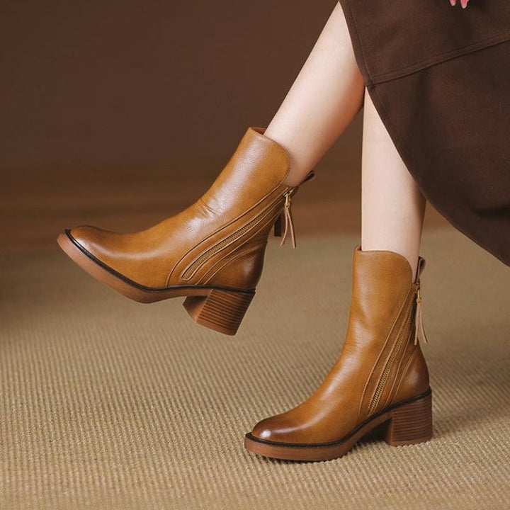 Selene ankle boots in black styled with tailored trousers