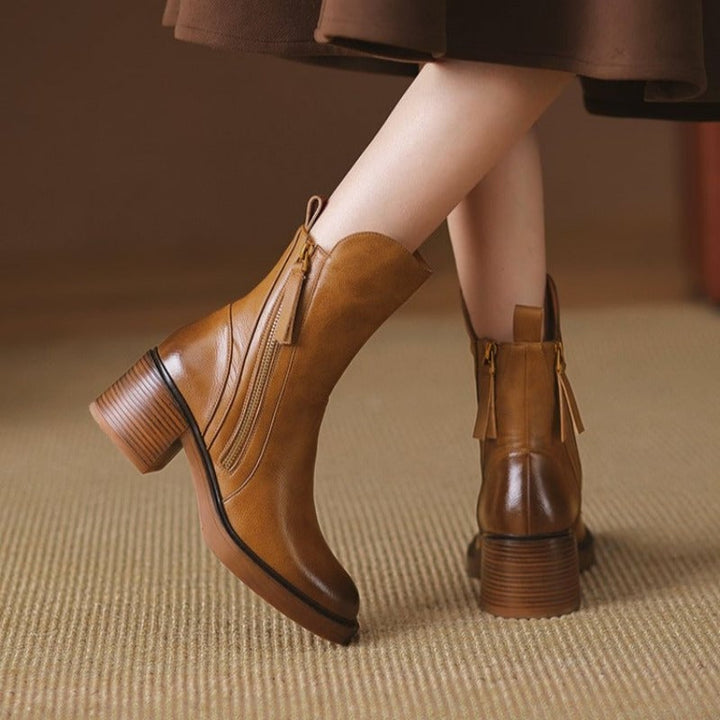 Overhead flat-lay of Selene ankle boots in brown and black side by side