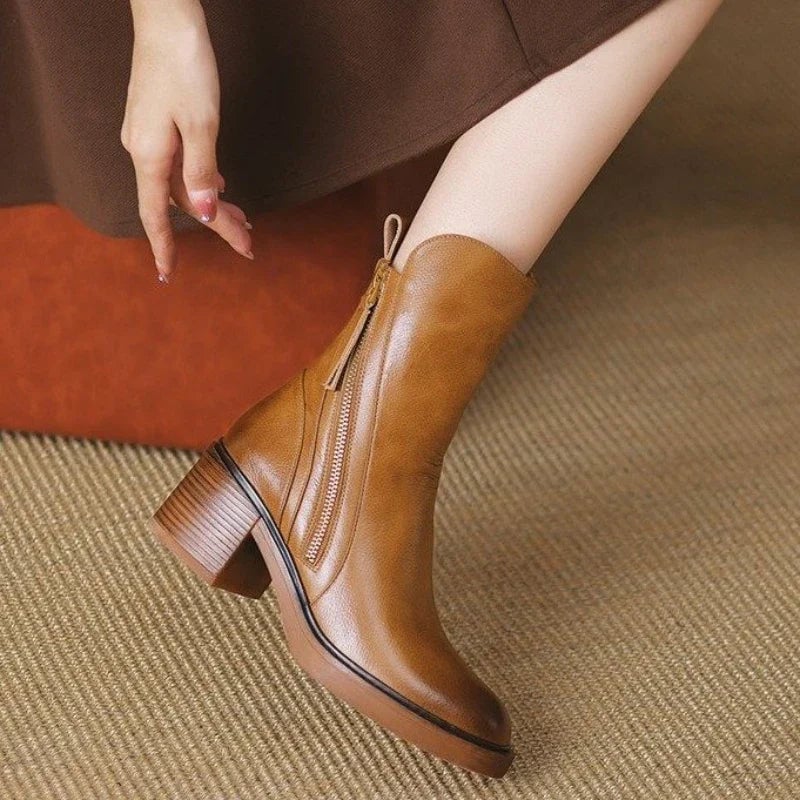 Selene ankle boots worn with a midi dress showing the leg-lengthening effect