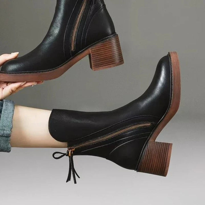 Back view of Selene ankle boots in brown highlighting the clean heel and silhouette