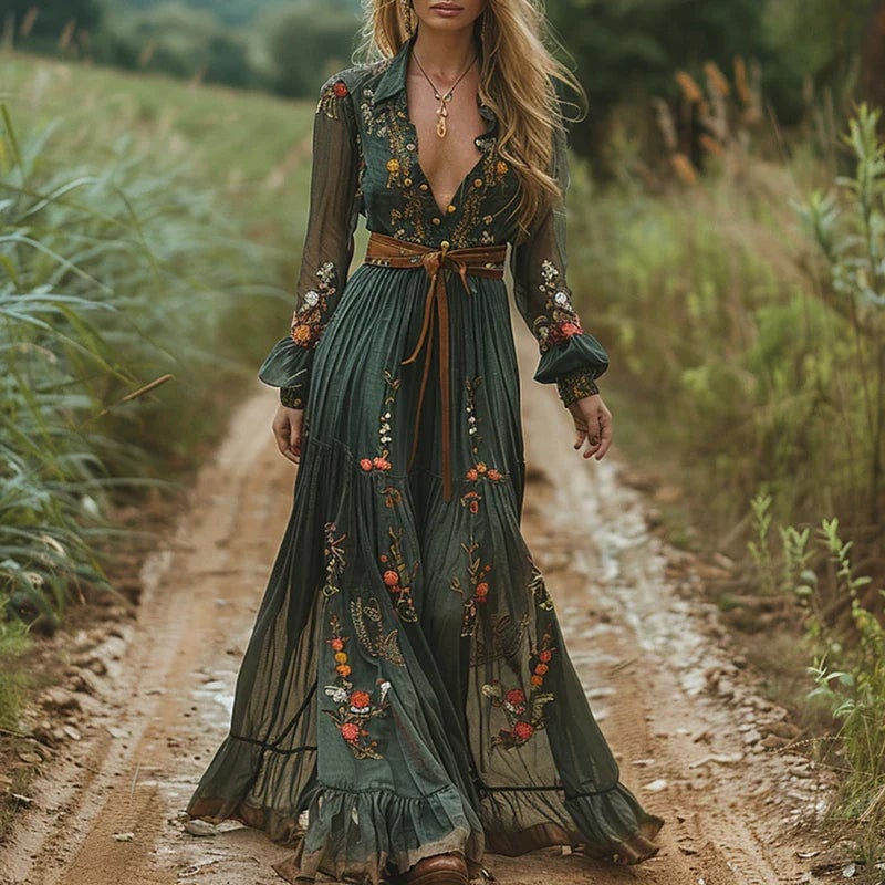 Model wearing a green bohemian floral maxi dress with pleated skirt and shirt collar, front view