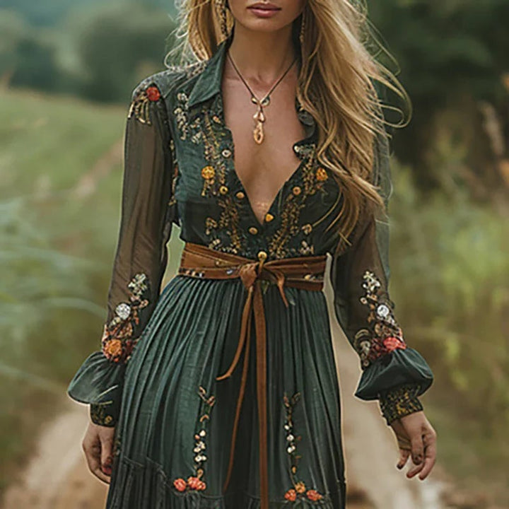 Close-up of retro floral print and button-down front detail on a green boho maxi dress