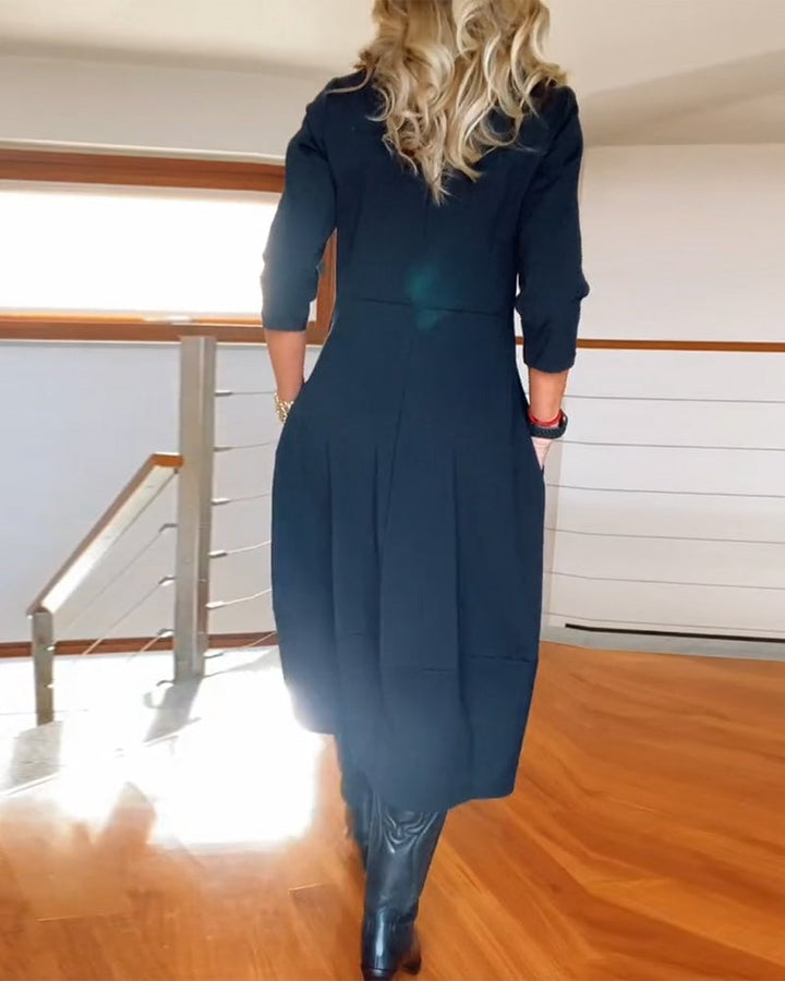 Seraphina dress in marine blue styled for a casual daytime look
