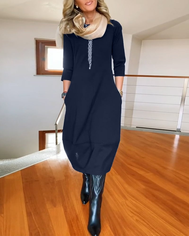 Front view of the Seraphina dress in burgundy highlighting the flattering fit