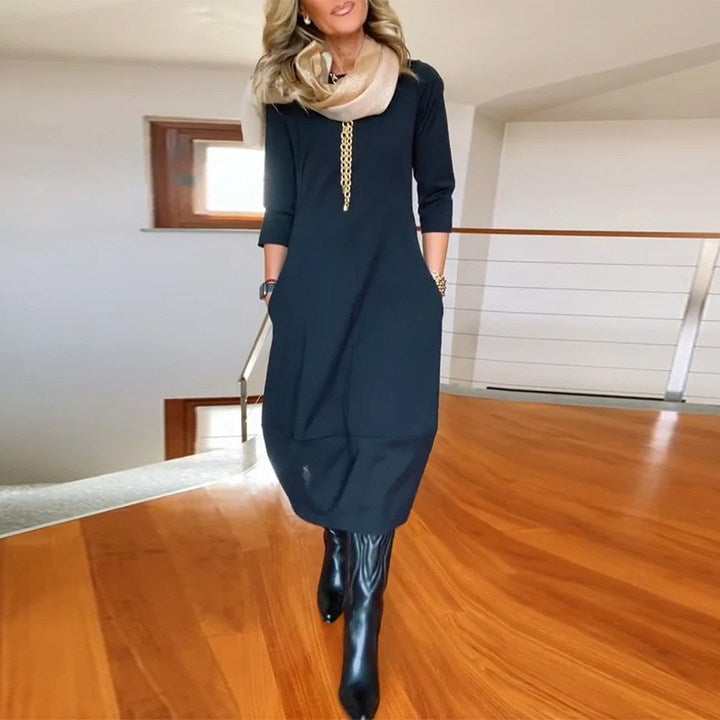 Overhead flat lay of the Seraphina dress in all five available colors