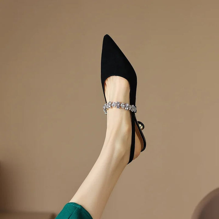 Back view of adjustable slingback closure on black Seraphina pump