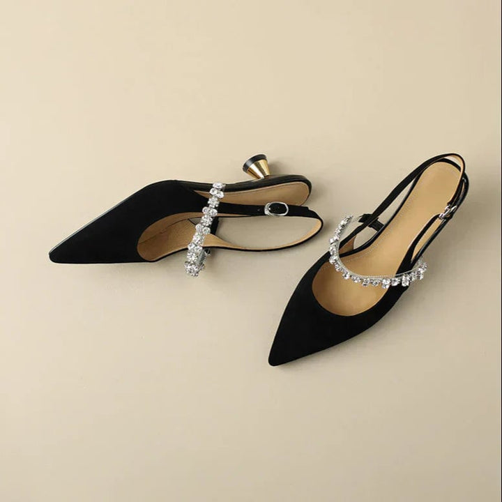 Black Seraphina heels styled with tailored trousers