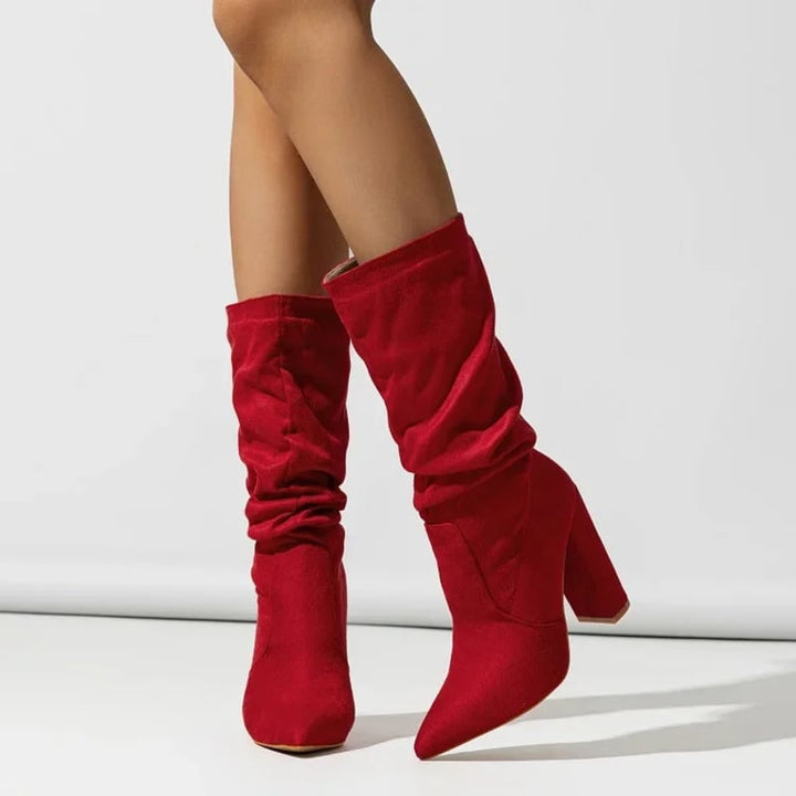 Florimay Serena slouchy boots in black displayed on a flat surface