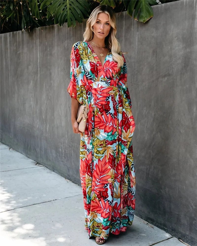 Woman wearing the Serena kimono-style wrap maxi dress in a flowing boho design, full front view