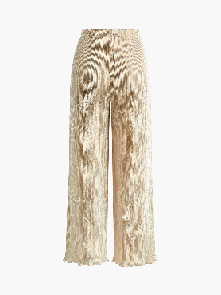 Full-length shot of woman in navy Serena wide-leg pants set