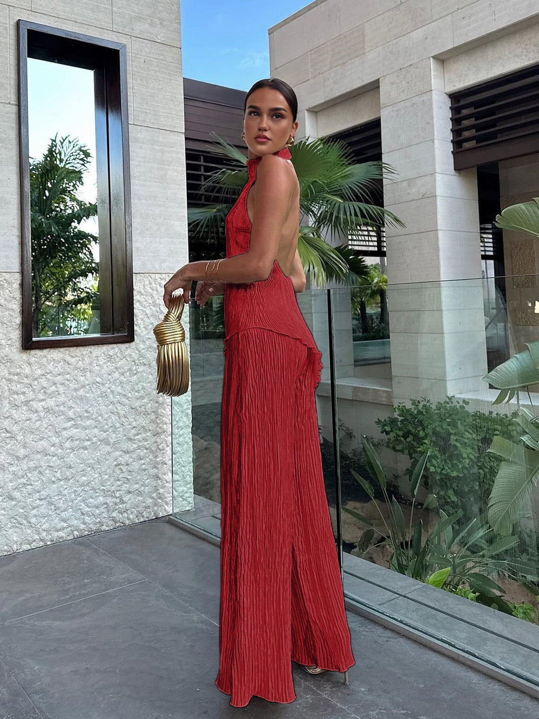 Flat lay of the Serena halter neck pleated top and wide leg pants set showing all color options