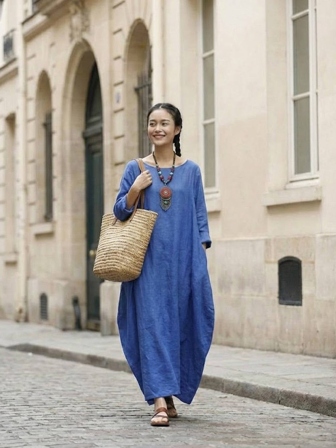 Woman wearing the Serena oversized boho maxi dress in Black, front view