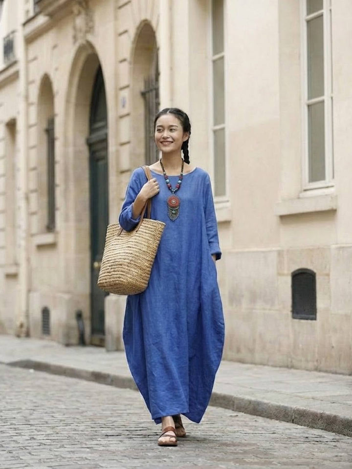 Woman wearing the Serena oversized boho maxi dress in Black, front view