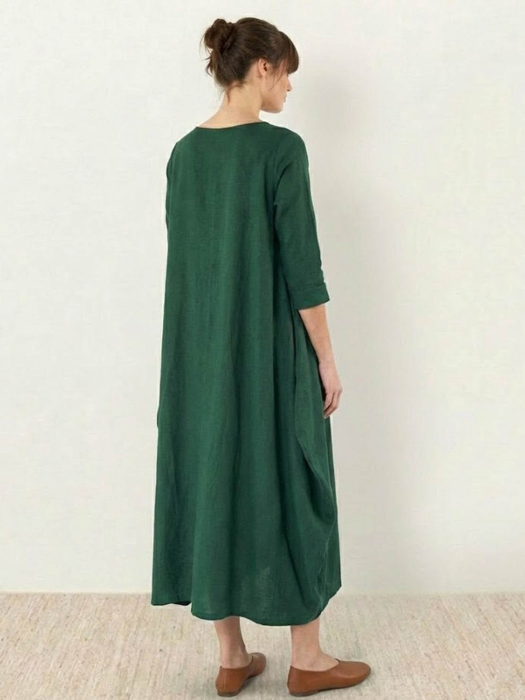 Close-up of the Serena maxi dress in Red showing relaxed batwing sleeve detail