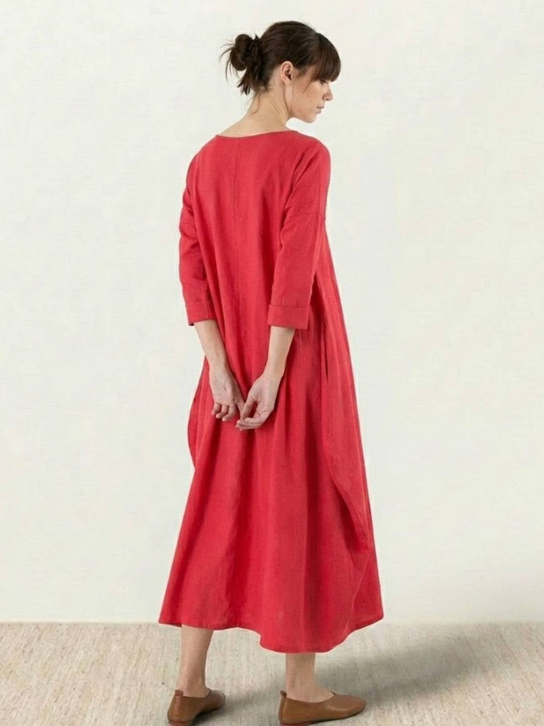 Close-up of the Serena maxi dress in White showing 3/4 batwing sleeve construction