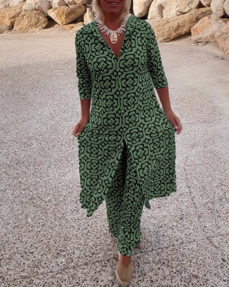 Front view of the Serena printed two-piece set in navy blue showing button-up blouse with lapels
