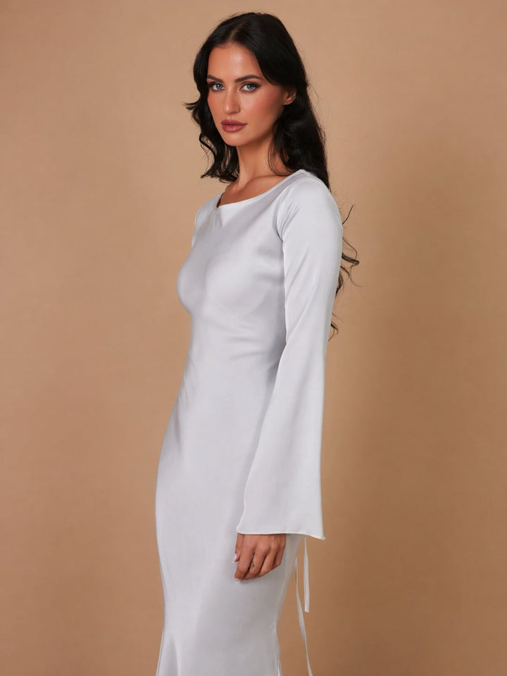 Full-length side view of the Serena ivory satin gown with subtle flare skirt