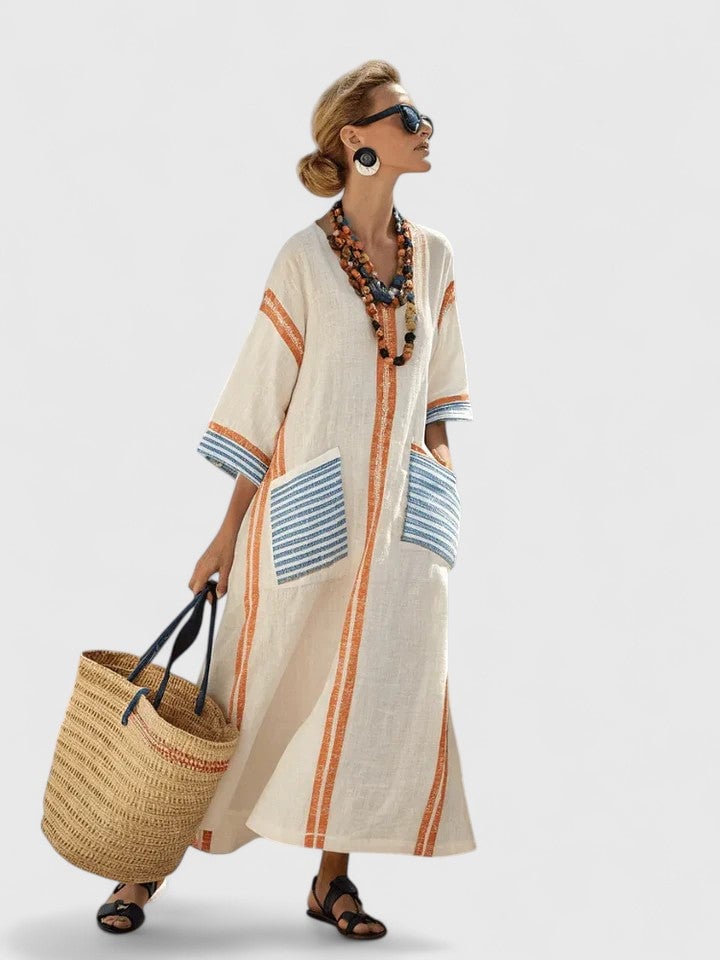 Front view of the Serena kaftan maxi dress in beige orange colorway showing V-neckline and vertical stripe detail