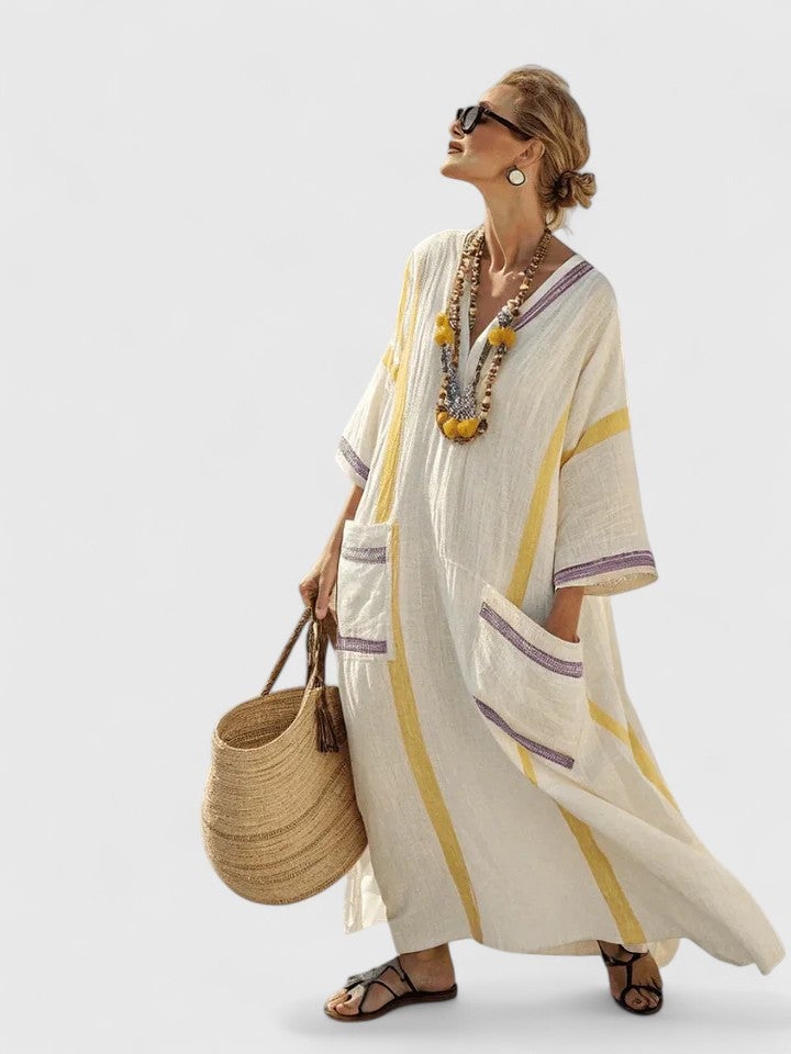 Full-length back view of the Serena white light pink kaftan maxi dress showing relaxed draping