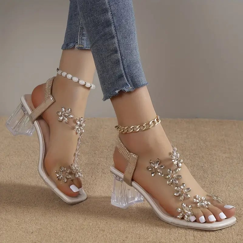 Serene champagne golden rhinestone block heel sandals shown from the front against a clean background