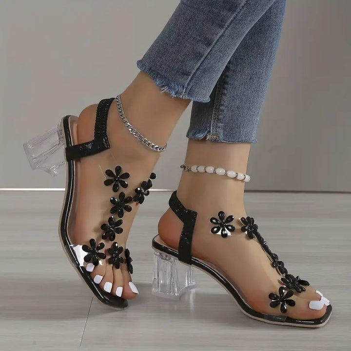 Serene rhinestone block heel sandals in black shown from the front against a clean background