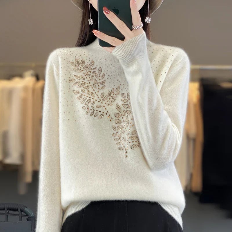 Close-up of the leaf-inspired embellishments on the Serenella Embellished Sweater