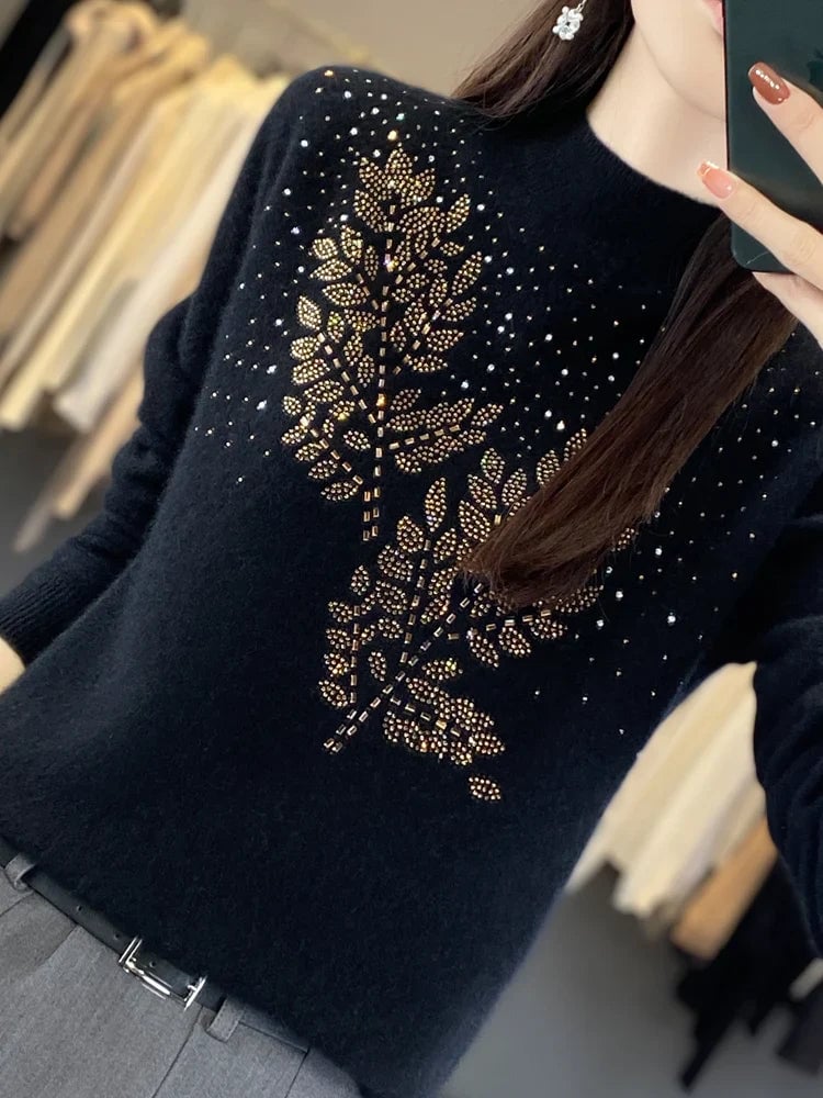 Flat lay of the Serenella Embellished Sweater showing texture and embellishment details
