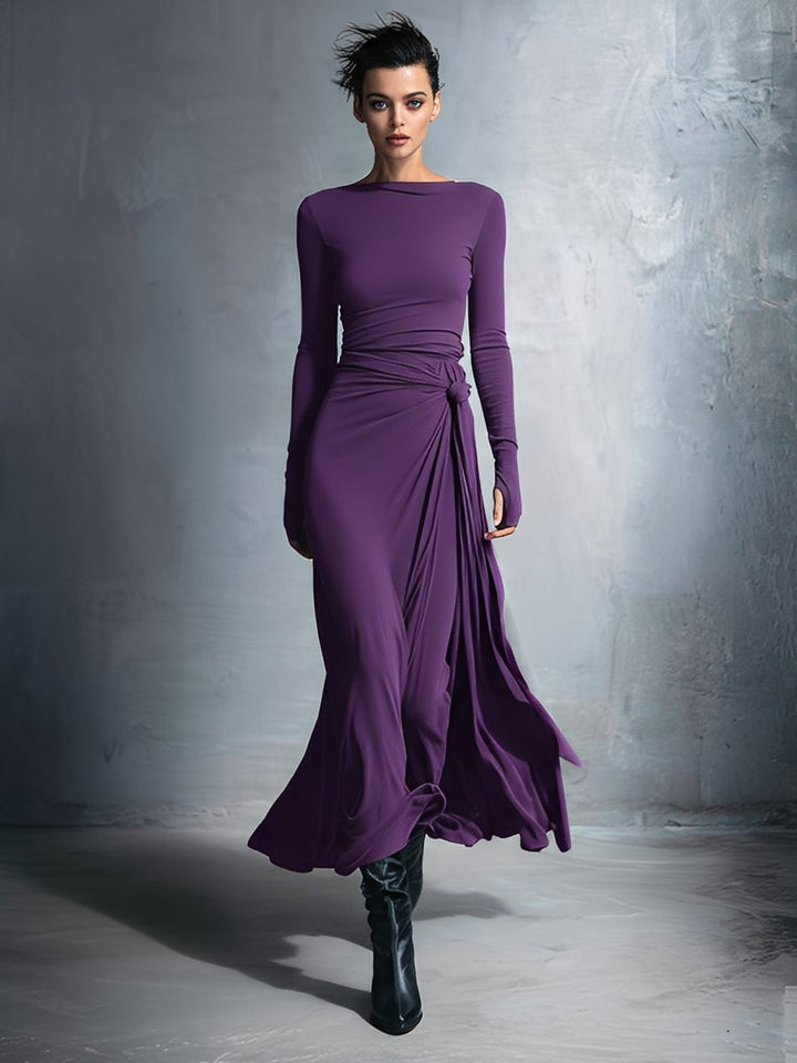 Full-length view of a purple wrap maxi dress with soft, fluid fabric draping gracefully