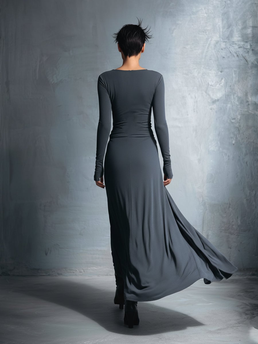 Model styling a wrap maxi dress casually with flat sandals for a daytime outfit