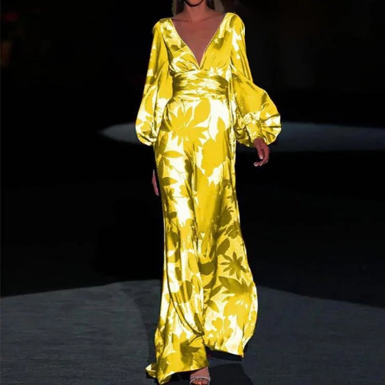 Front view of the Seste floral satin maxi dress in yellow, showing the wrap V-neck and gathered puff sleeves