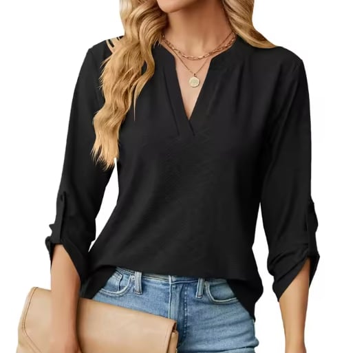 Model wearing the Shanice blouse in green styled with casual bottoms