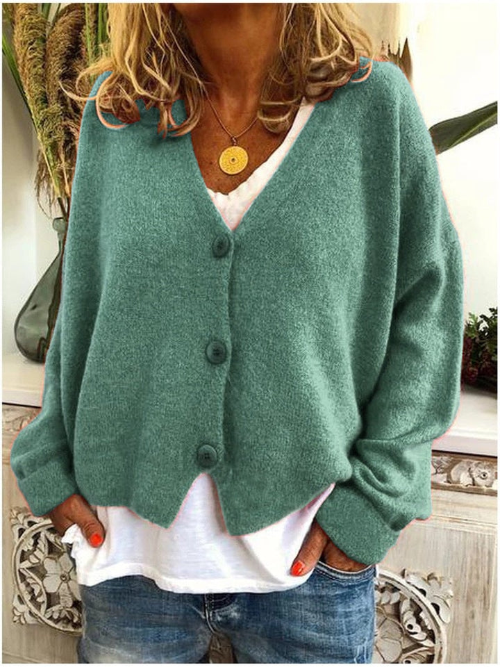 Side profile of the Shannon knit cardigan showing relaxed fit and clean knit construction